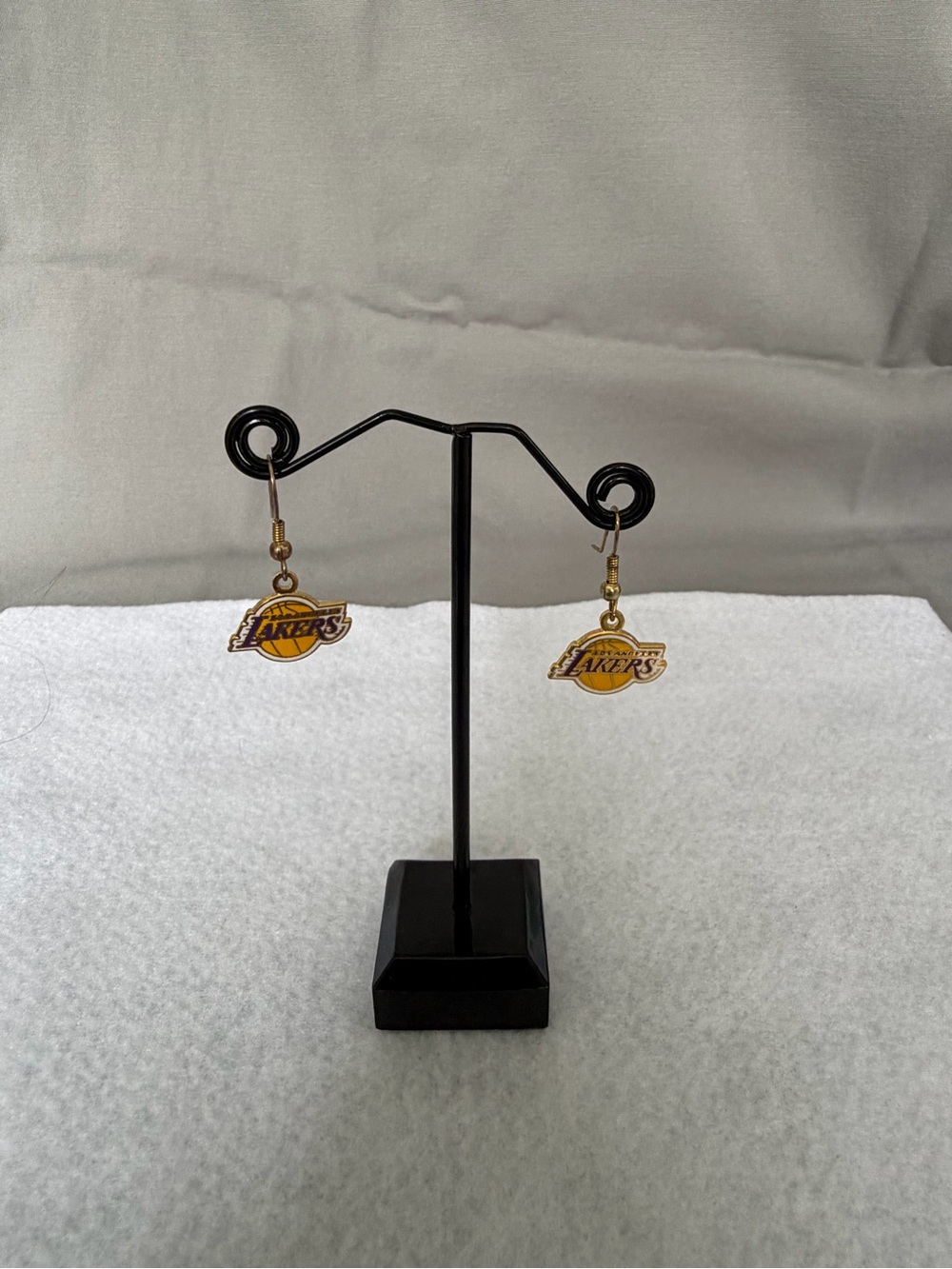 NBA Los Angeles Lakers Gold and Purple Logo Dangle Earrings.
